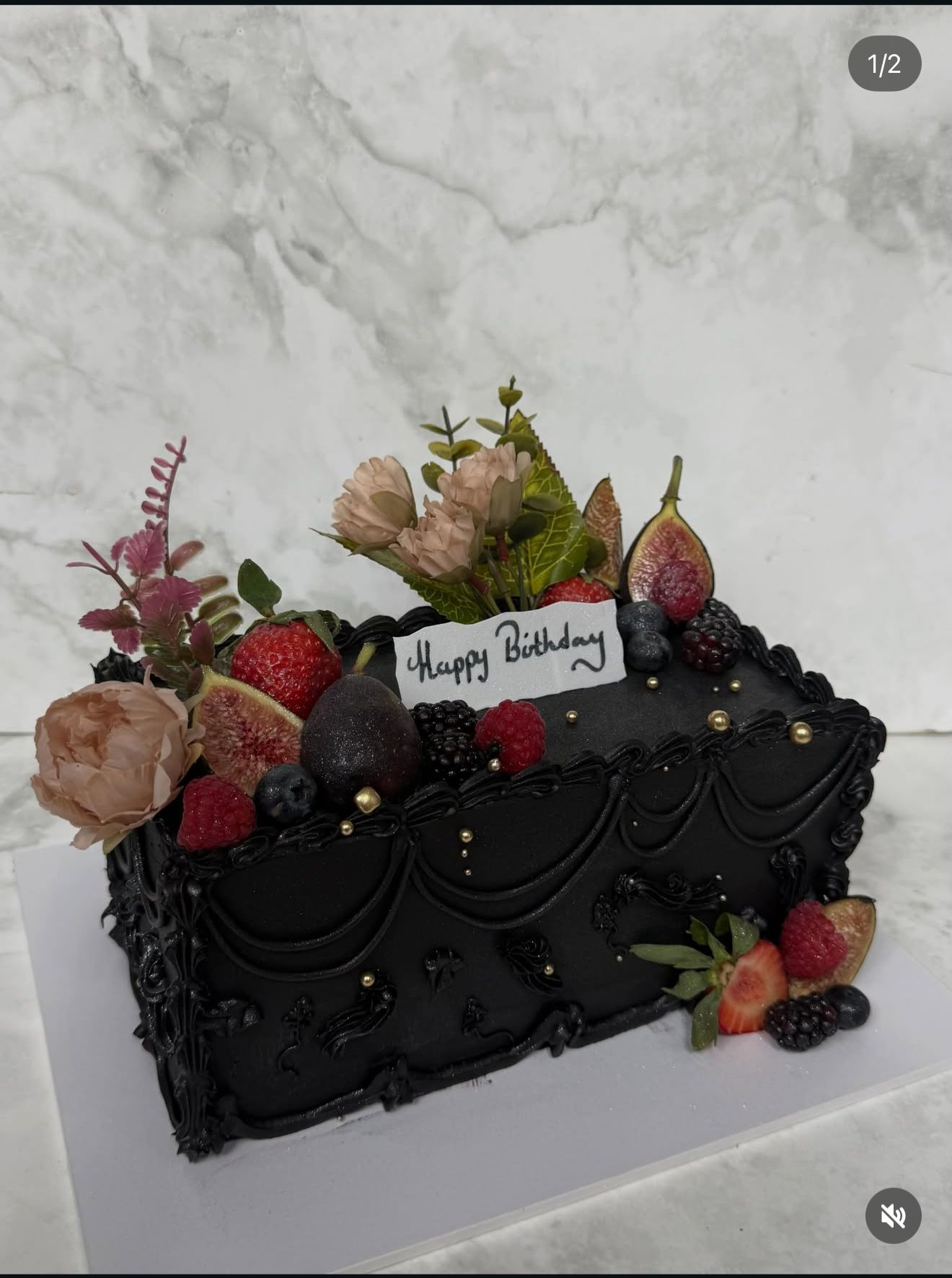 Dark chocolate birthday cake with fresh fruits and flowers — Desi Cakes & Shakes Oldham